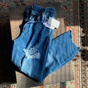 High rise, slim fit, straight leg distressed recycled denim.